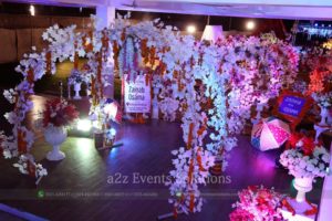 floral entrance decor, cross ring decorated with mehndi stuff