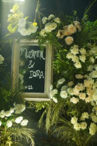 welcome board, floral decorations